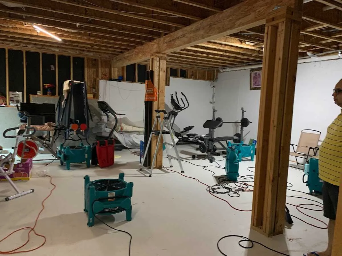 Basement drying equipment setup for Contents Cleaning & Restoration in Harpswell